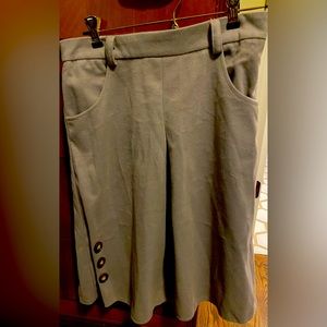 Gray flannel skirt. A-line. Runs small.